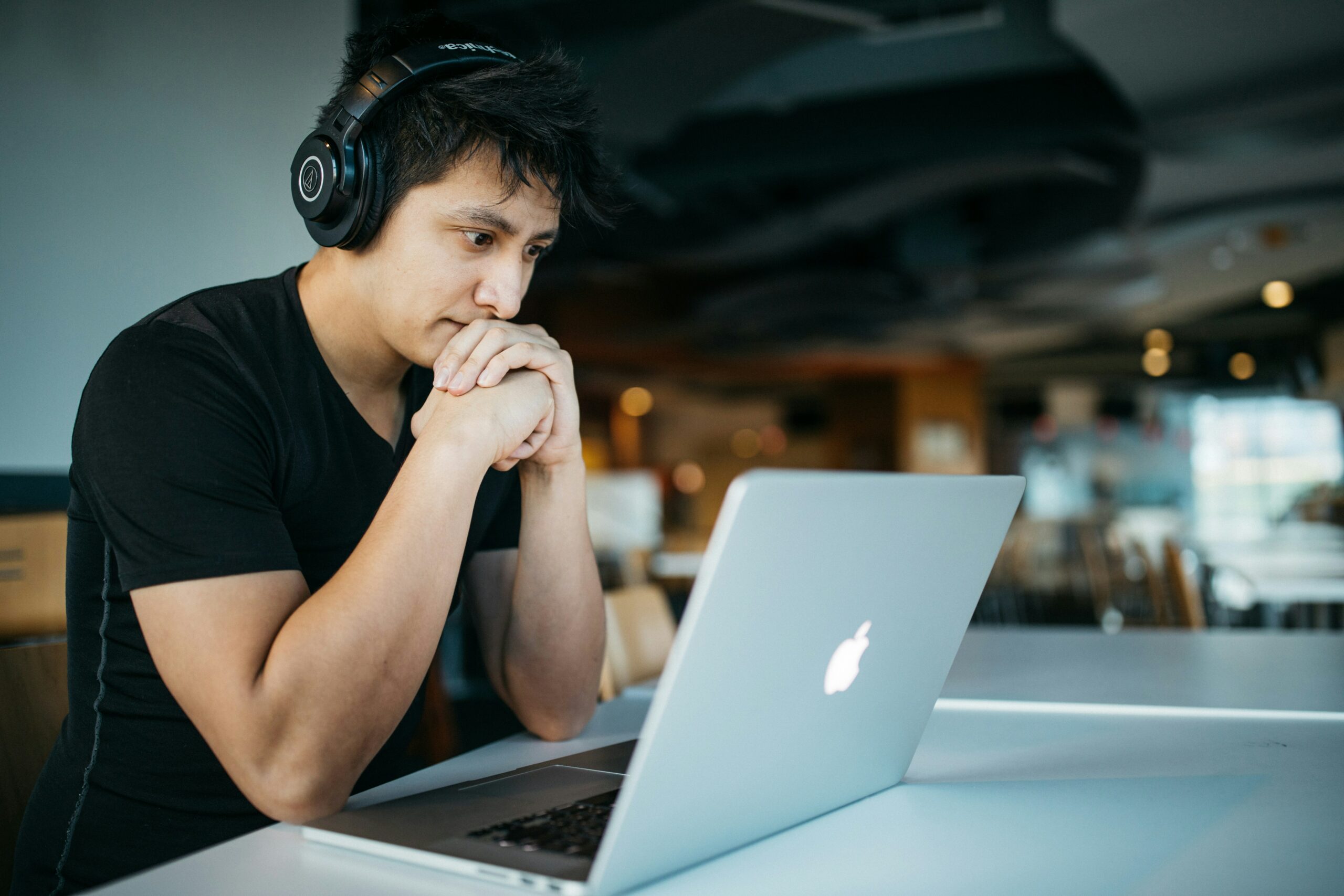 Image of a student studying on his laptop - Destination Certification