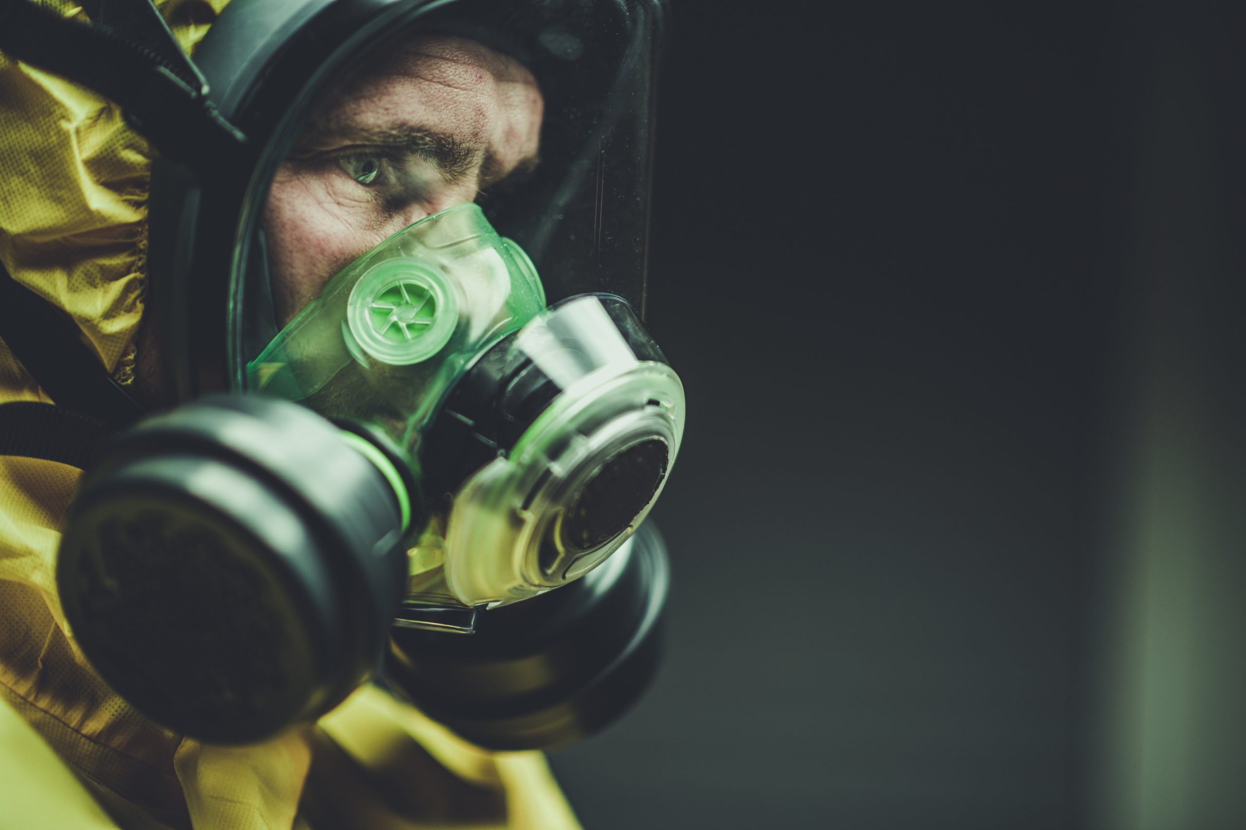 A person wearing a gas mask - Destination Certification
